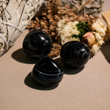 Black Onyx Tumbled Stone Set - helmsman - crystal
