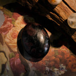 Garnet Palm Stone - helmsman - crystal