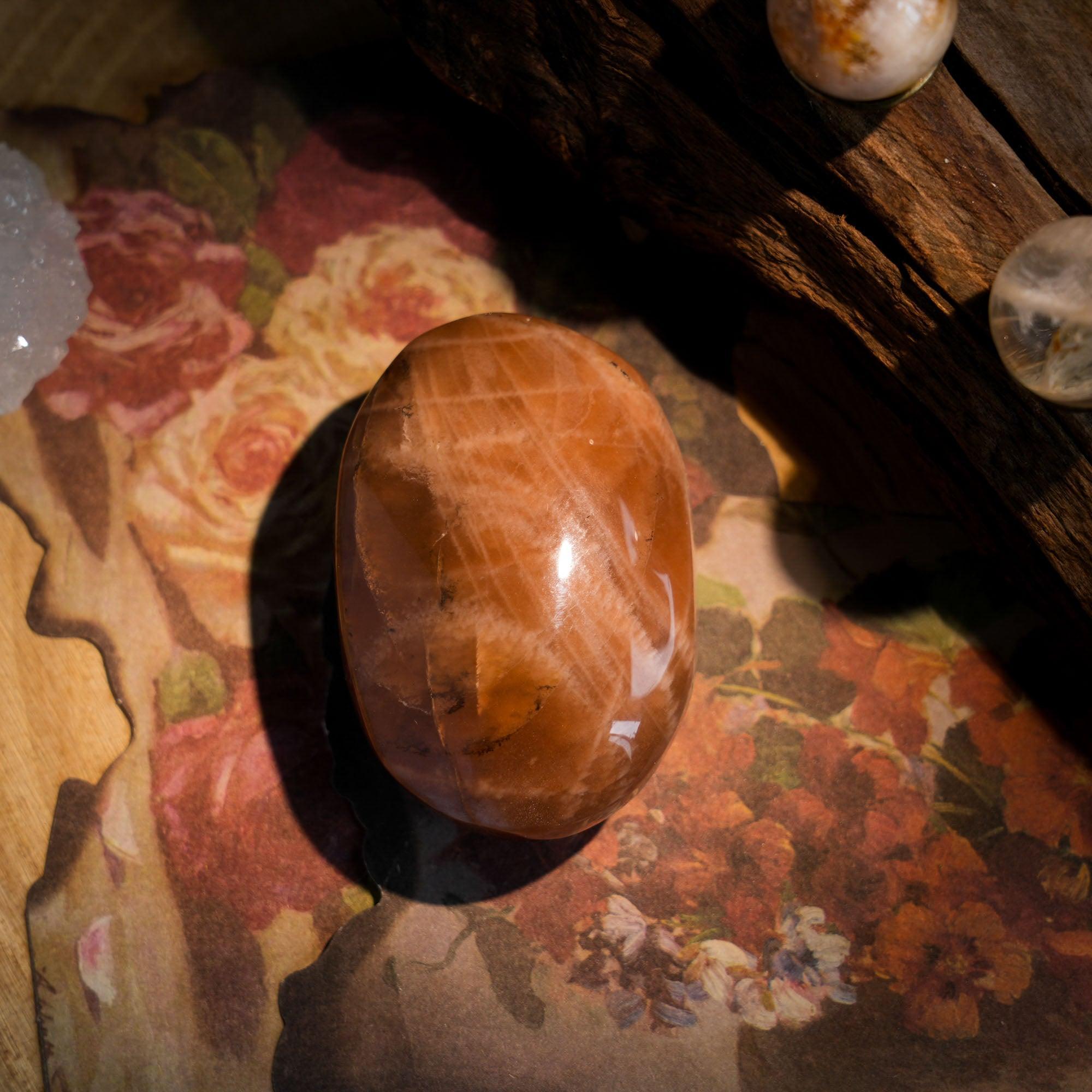 Golden Sun Stone Palm Stone - helmsman - crystal