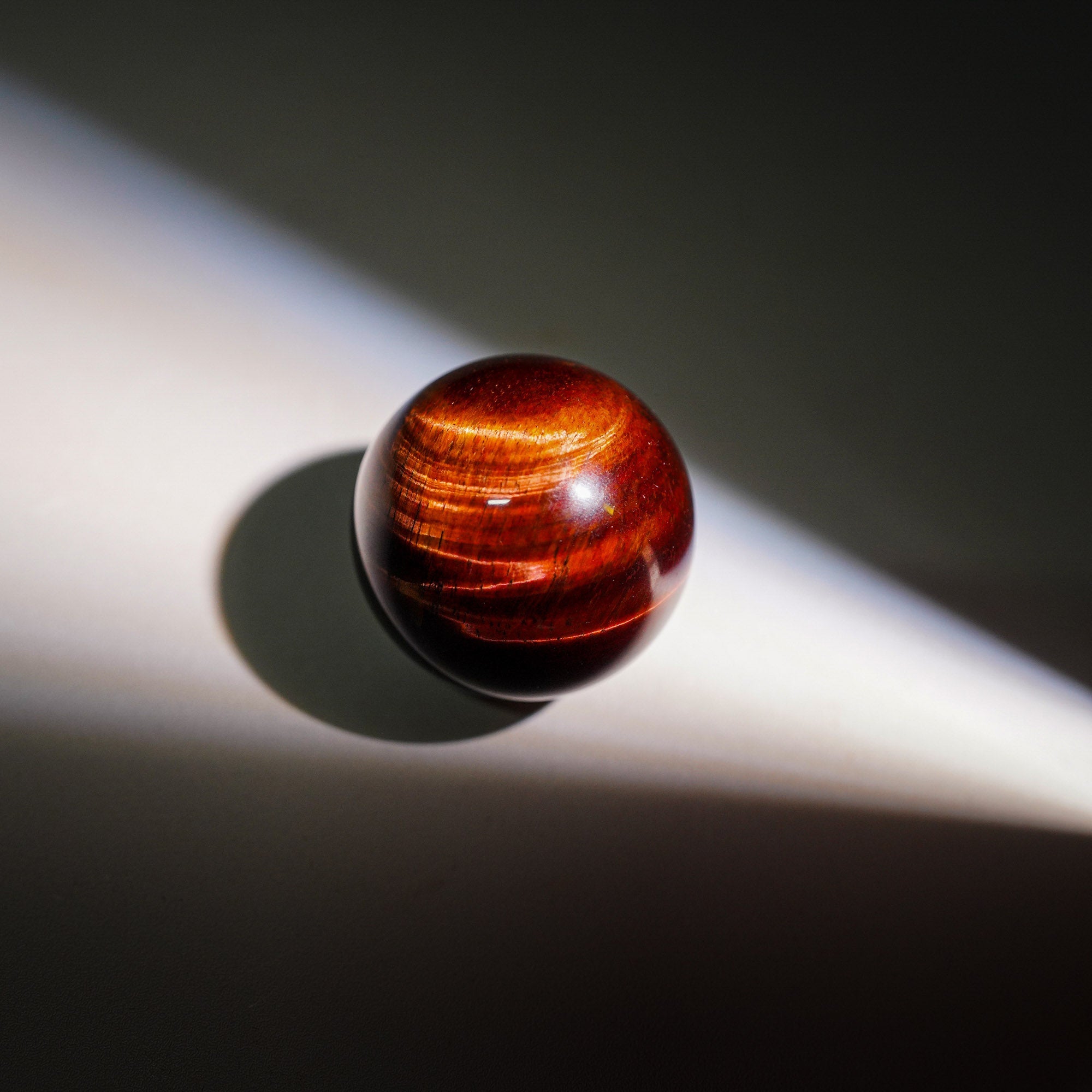 Red Tiger Eye Sphere - helmsman - crystal