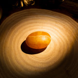 Yellow Calcite Palm Stone - helmsman - crystal