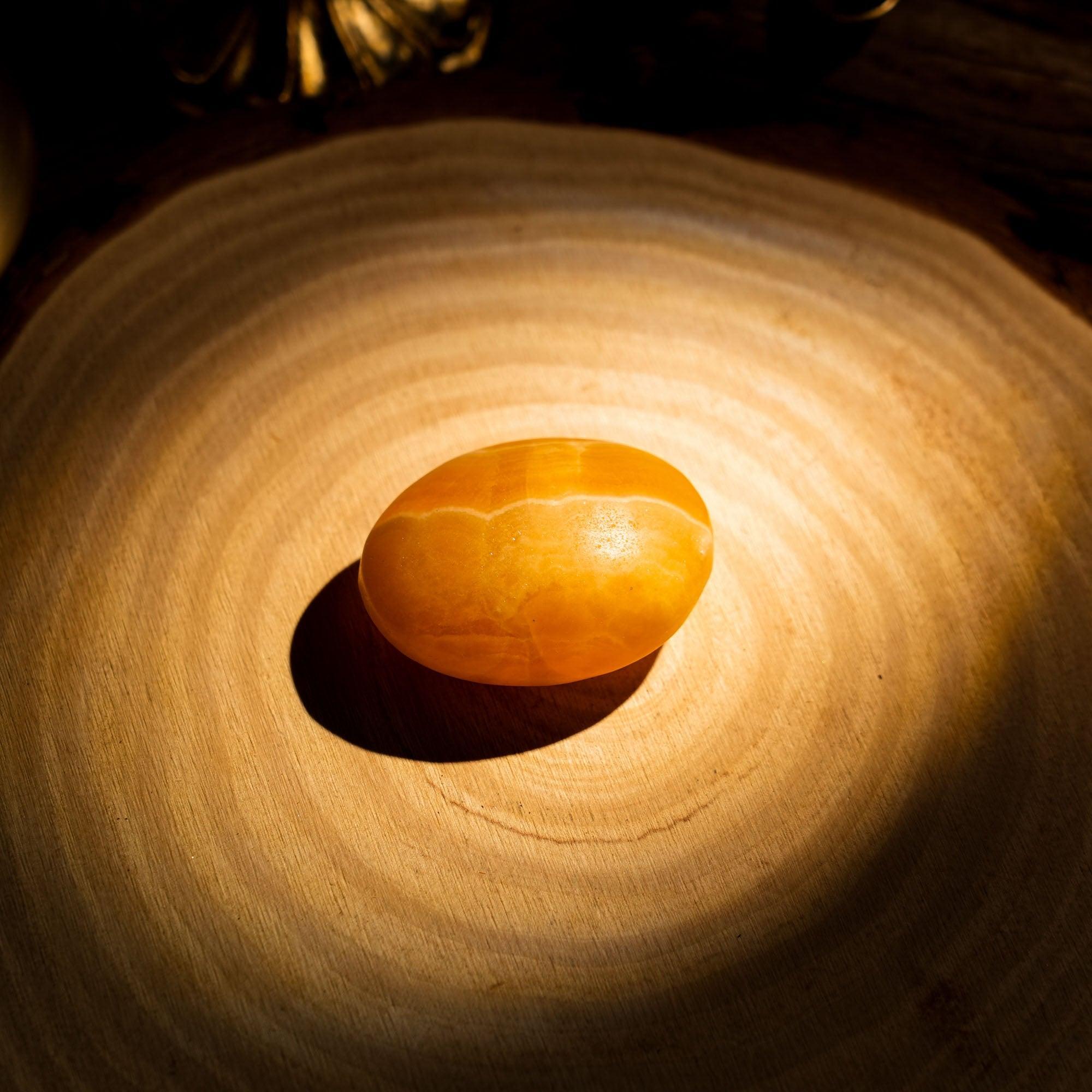 Yellow Calcite Palm Stone - helmsman - crystal