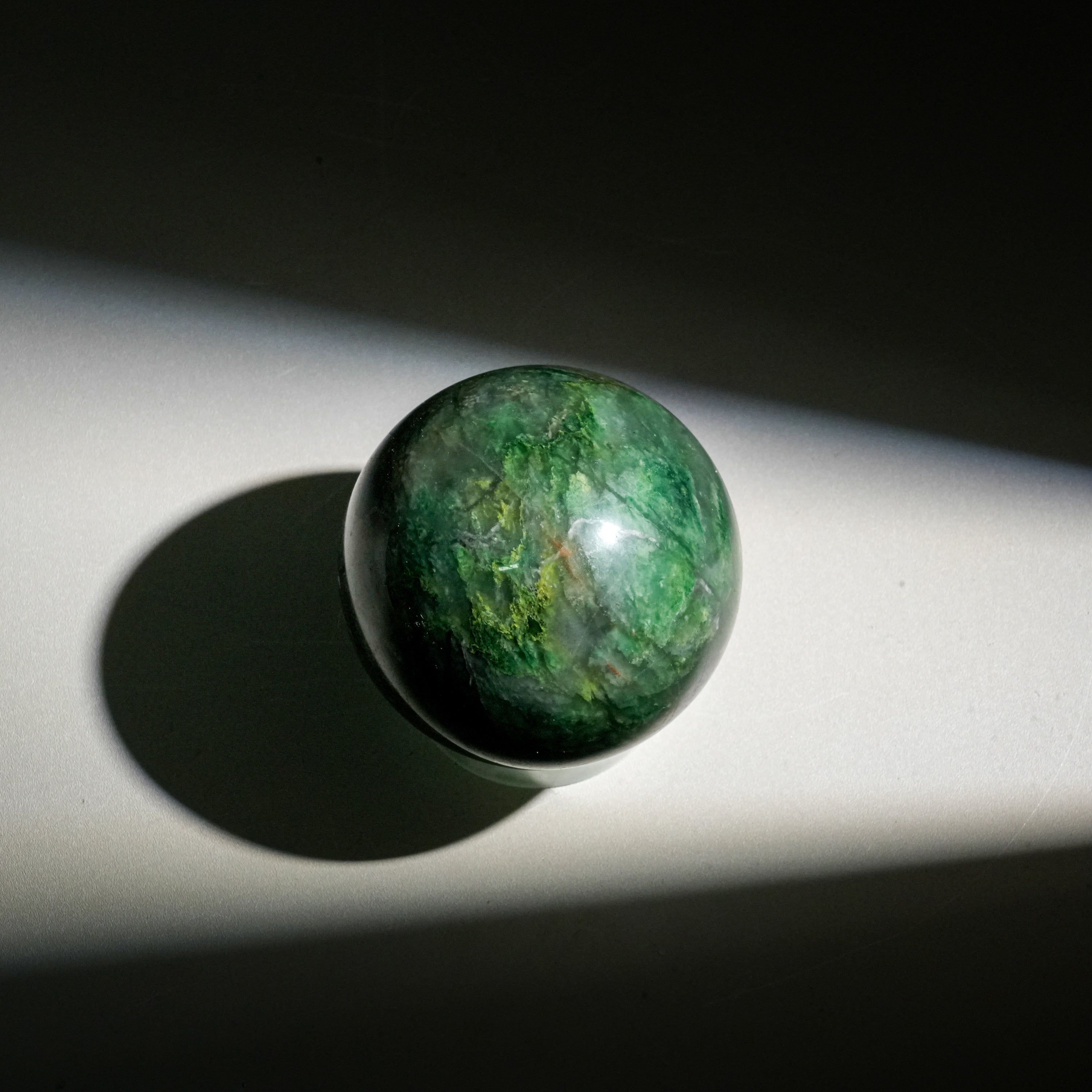 African Jade Sphere-Helmsman Crystal