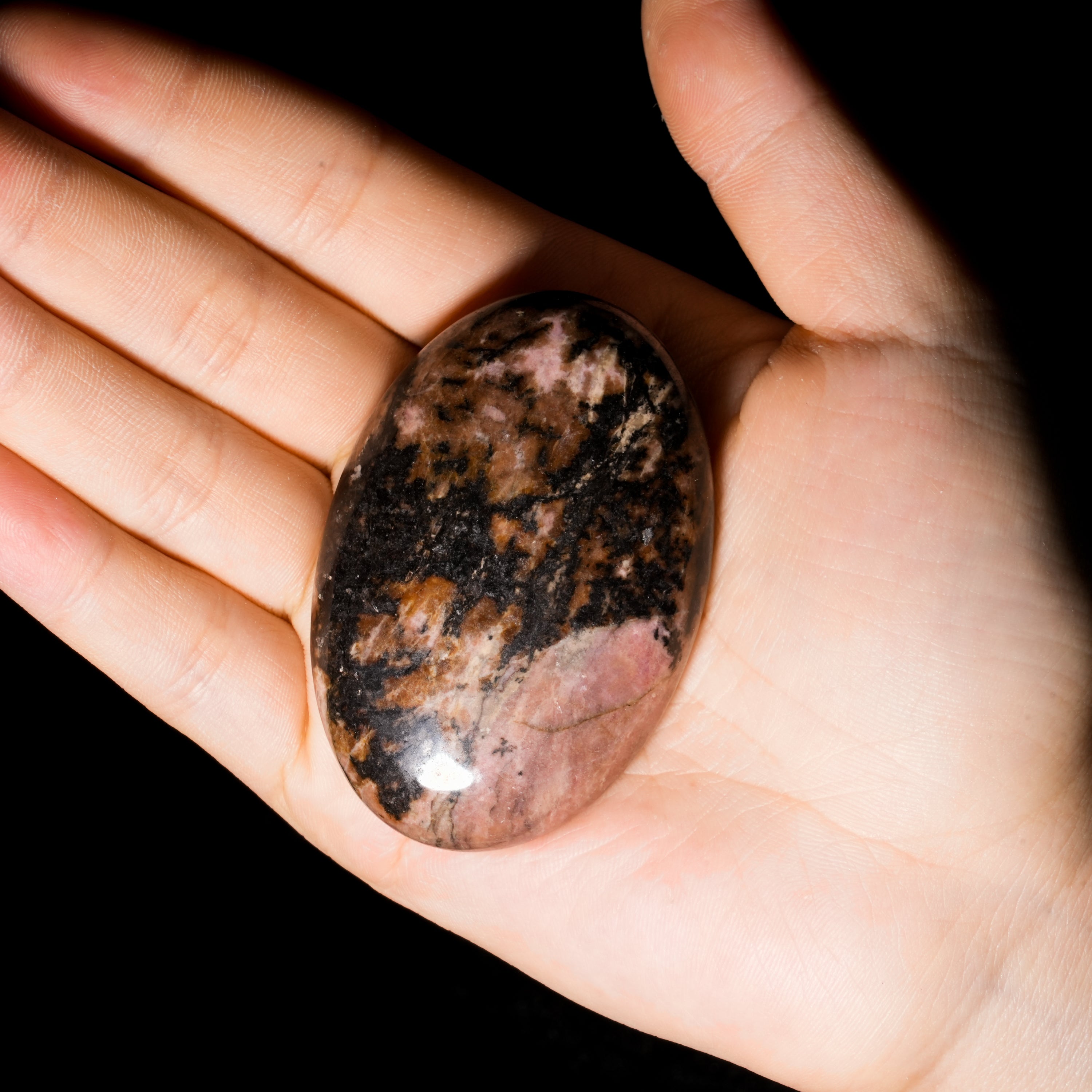 Black Rhodonite Palm Stone-Helmsman Crystal