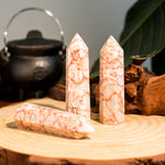 Red Network Stone Point-Helmsman Crystal