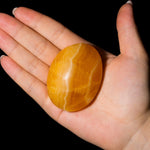 Yellow Calcite Palm Stone - helmsman - crystal